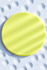 Yellow Circle on Textured Concrete Surface