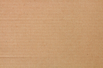 Cardboard sheet texture background, detail of recycle brown paper box pattern.