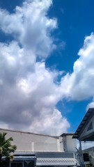 The sky was a mix of blue and clouds — beautiful, but the moment I exited the mall, the brightness and heat hit me hard.