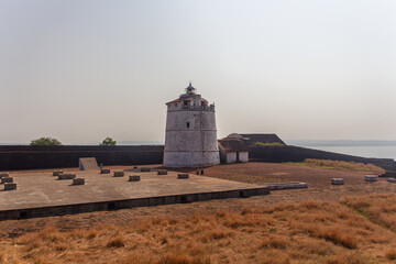 Historic Aguada Fort Lighthouse overlooking Goan sea