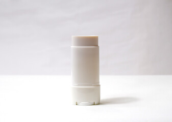 Sun stick on white background, sunscreen