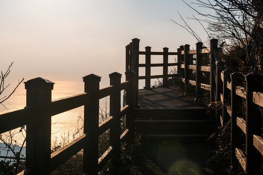 wooden walkway on the cliff at the seaside