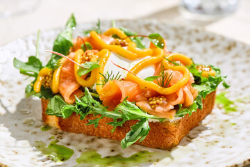 Brioche bread bruschetta with smoked salmon and poached egg, bright natural lighting, overhead composition