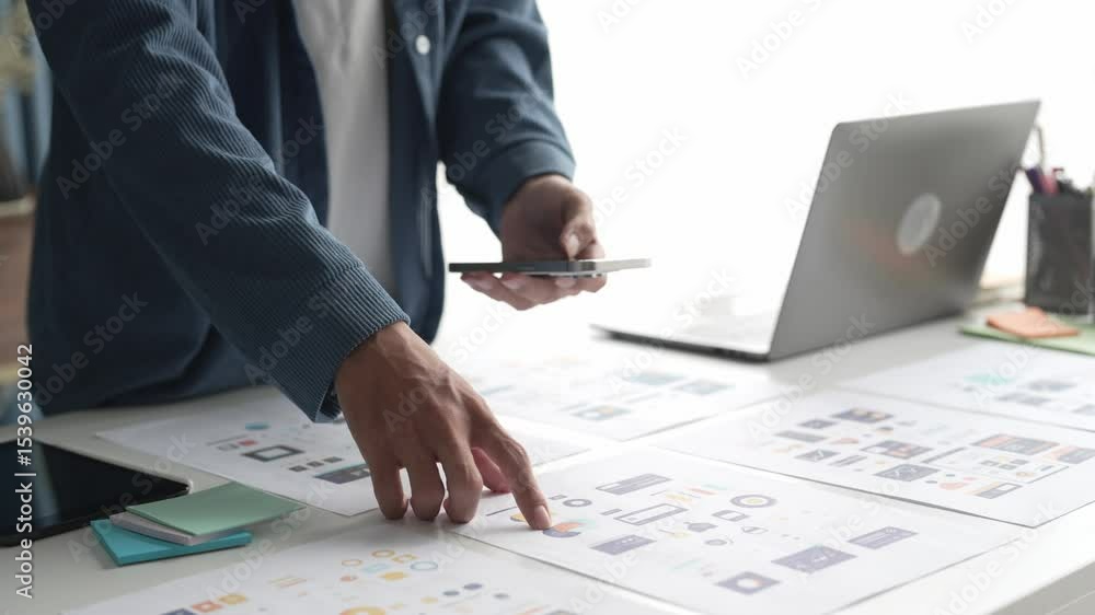Poster man designing ux ui and programming in tech environment.
