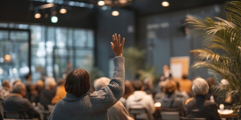 Man Asking Question During Seminar or Conference