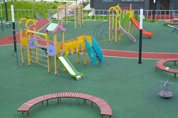 Colorful Playground with Slides and Climbing Frames