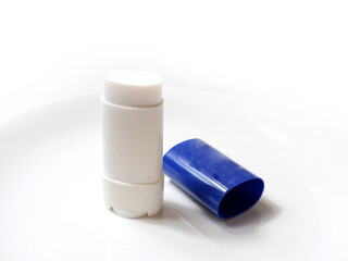 Sun stick on white background, sunscreen