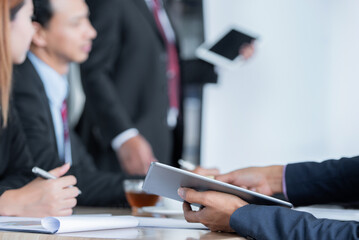 Speaker Motivational by present document to boss colleagues to decide. coworker coach explain Analysis Statistics Report drawing graph presentation to business improvement teamwork.