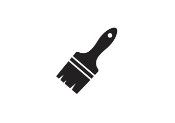 A black paint brush is oriented on a white background at a slight angle