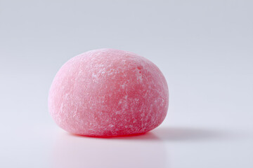 Close-up of Pink Mochi Rice Cake Isolated On White