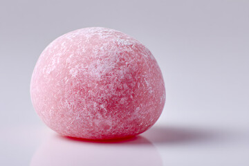 Close-up of Pink Mochi Rice Cake Isolated On White