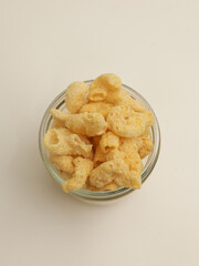 Crunchy snacks or chips on white background