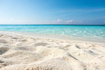 Beach with a blue ocean and a white sand