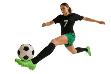 Soccer Player's Powerful Kick: A focused athlete delivers a forceful kick, showcasing strength, agility, and the dynamic energy of competitive sports.