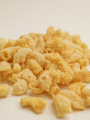 Crunchy snacks or chips on white background