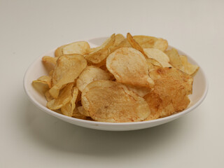 Crunchy snacks or chips on white background
