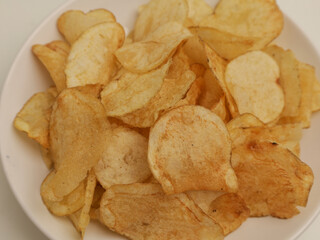 Crunchy snacks or chips on white background