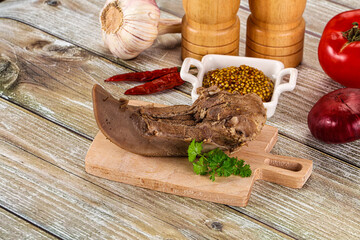 Steamed pork tongue with mustard