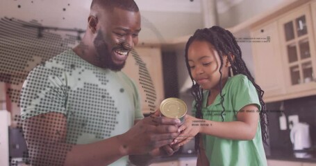 Father lifting can teaching daughter gripping it on counter showing animated food ingredient labels - Powered by Adobe