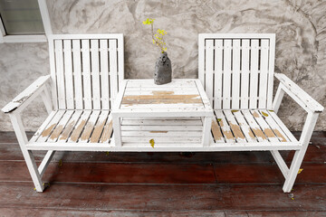 White chair on wooden floor