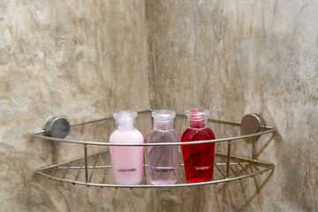 White towels with soap on a rack in the bathroom.