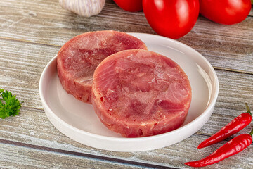 Raw round tuna fish fillet