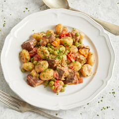 Gnocchi with tofu and green peas