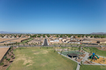 New neighborhood building around a playground in the suburbs
