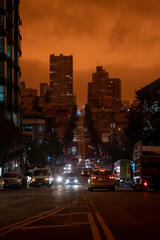 Naklejka premium Muted street scene of San Francisco blanketed in orange haze from wildfires, September 9, 2020