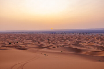 Sunrise panoramic landscape views of Erg Chebbi sand dunes located in Morocco on the western edge of the Sahara Desert