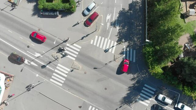 Directly adobe traffic or a three-way intersection with cars in Rovaniemi, Finland