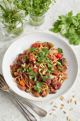 Mediterranean vegetable bolognese on a white plate
