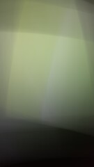 Obraz premium A soft gradient flows through layered shades of green and gray, creating a tranquil, abstract composition with modern depth and harmonious minimalism.