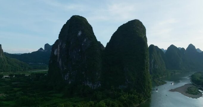 Aerial view in front of the Yuanbao Mountains, summer evening in Xingping, China