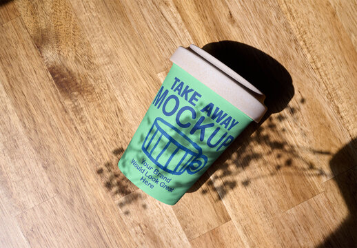 Takeaway Coffee Cup Mockup on Wood. PSD template mockup.