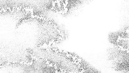 Abstract grayscale speckled texture background with concentrated grey particles forming a frame around a central white space irregular pattern design element