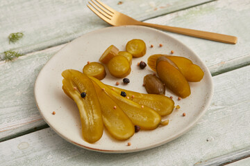 Pickled cucumbers in a glass jar