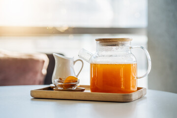 Brewing a refreshing cup of tea for breakfast on a sunny morning