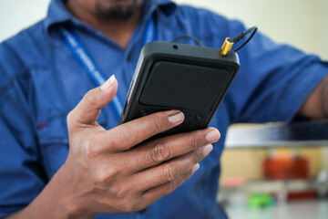 man holding a mobile phone