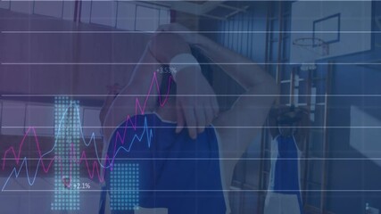 Lead sports player stretching arm in gym launching graphs peaking fading as team preparing drill - Powered by Adobe