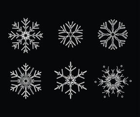 "Realistic Snowflake Icon Set &ndash; White Winter Snow Crystals on Black Background for Holiday and Seasonal Design"
