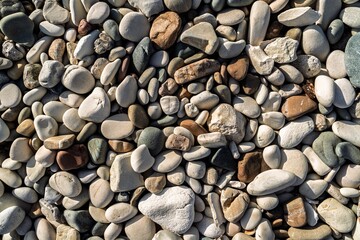 A close-up of smooth beach stones, showcasing nature s artistry. The rounded stones in calming...