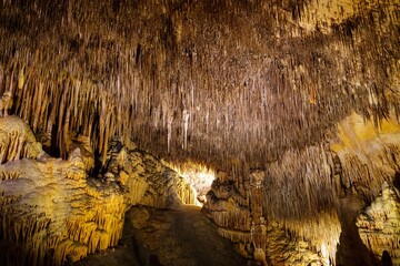 Discover the stunning stalactite formations of a hidden cave in Mallorica, Spain, showcasing the...