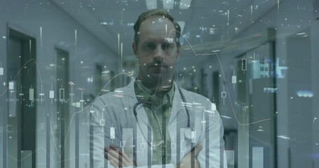 Male doctor crossing arms in medical corridor as financial charts materializing around him - Powered by Adobe