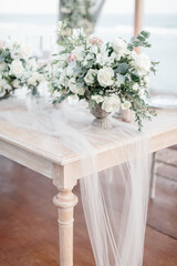 lovely Table setting for magnificent composition from flowers at a wedding , Centerpiece white and...