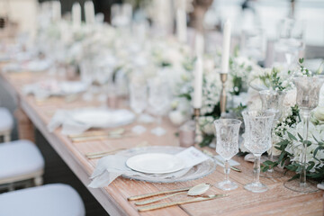 lovely Table setting for magnificent composition from flowers at a wedding , Centerpiece white and orange color palette flower bouquet arrangement