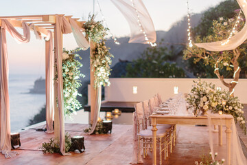lovely Table setting for magnificent composition from flowers at a wedding , Centerpiece white and...