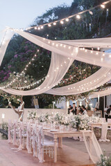lovely Table setting for magnificent composition from flowers at a wedding , Centerpiece white and...