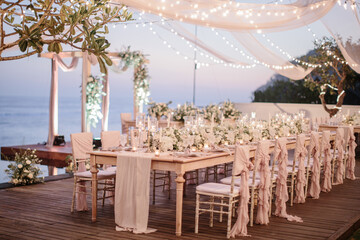 lovely Table setting for magnificent composition from flowers at a wedding , Centerpiece white and...