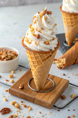 Italian Gelato Cone with Whipped Cream and Nuts.
